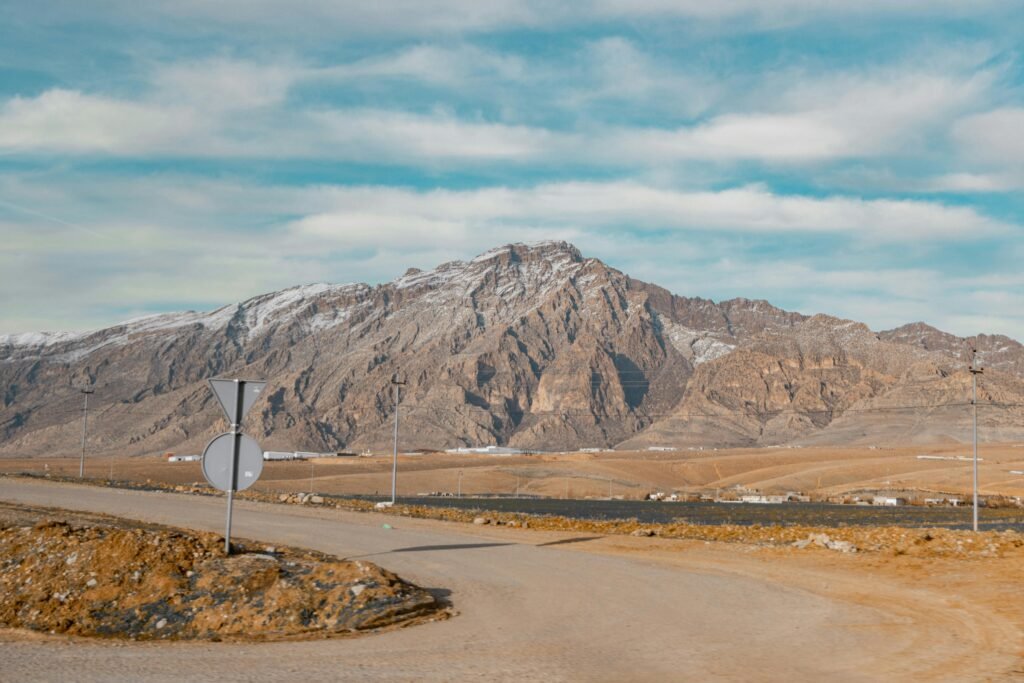 Beautiful mountain landscape with road signs in Sulaymaniyah, Kurdistan Region, Iraq.